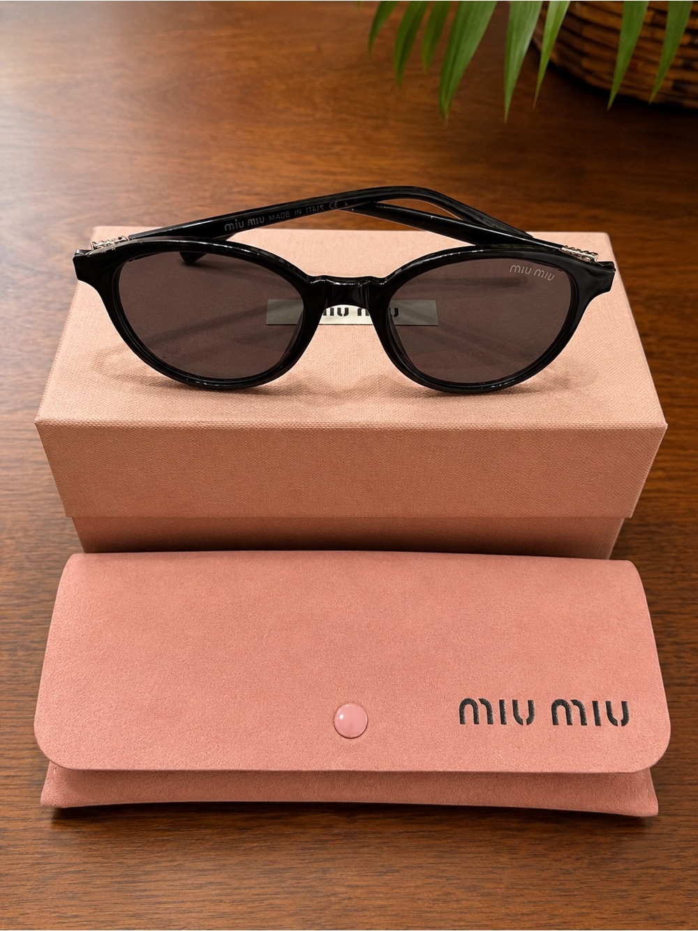 Miu Miu Black Oval Sunglasses - Picture 3 of 3